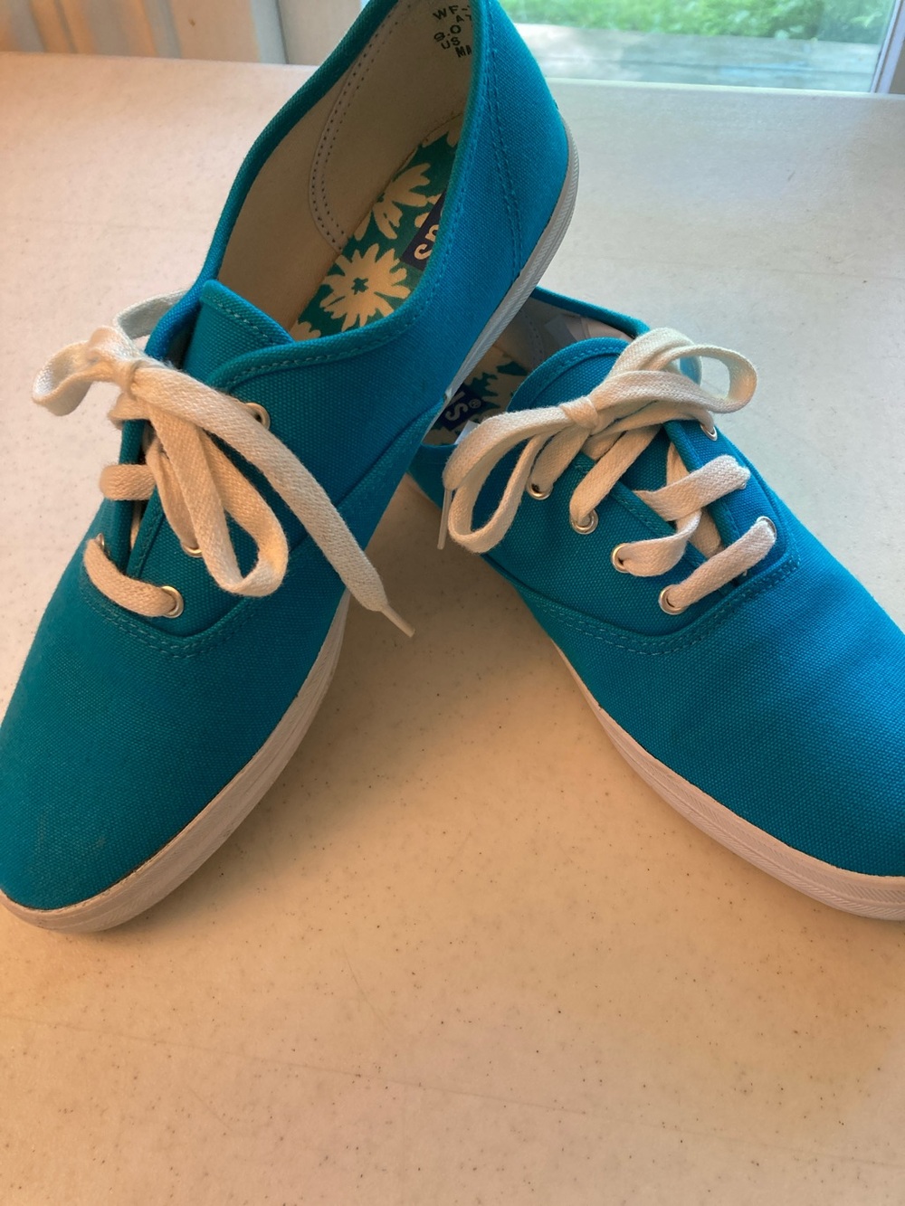 Keds Blue Canvas Sneakers with White Floral Insole